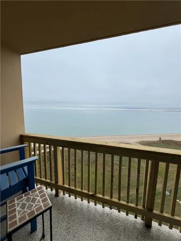 a balcony with a bench