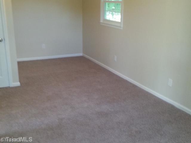 102 Westridge Drive King, NC 27021 - Photo 7 of 11 Master Bedroom. Large master suite.
