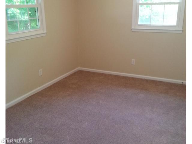 102 Westridge Drive King, NC 27021 - Photo 8 of 11 2nd Bedroom. Second level second bedroom with view of pool.
