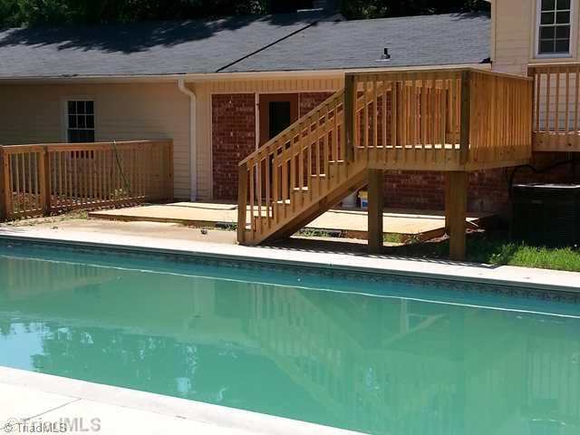 102 Westridge Drive King, NC 27021 - Photo 10 of 11 Exterior Back. Large inground pool.
