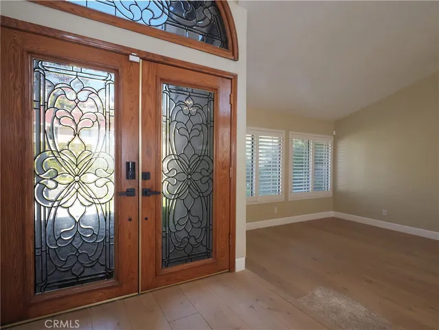 a view of an entryway with a door