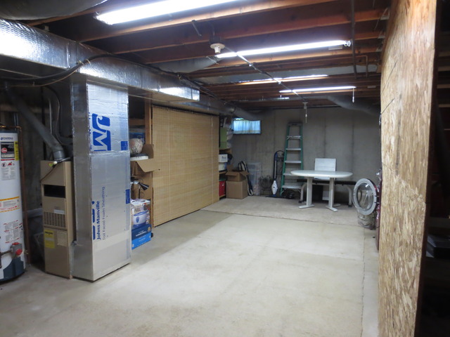14820 South Penn Road Plainfield, IL 60544 - Photo 17 of 25 a view of empty room with wooden floor