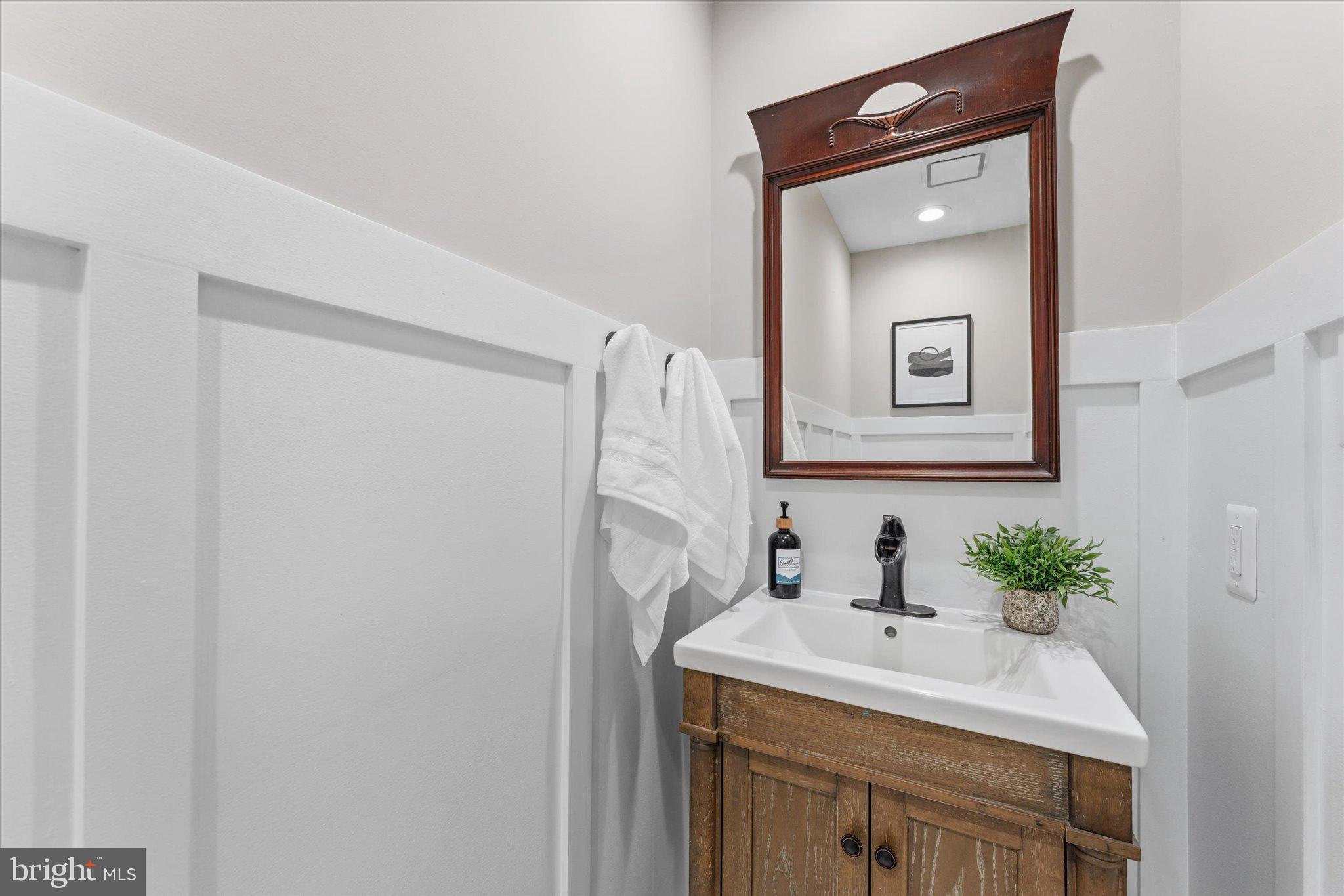 8047 Counselor Road Manassas, VA 20112 - Photo 18 of 55 Updated main-level powder room.
