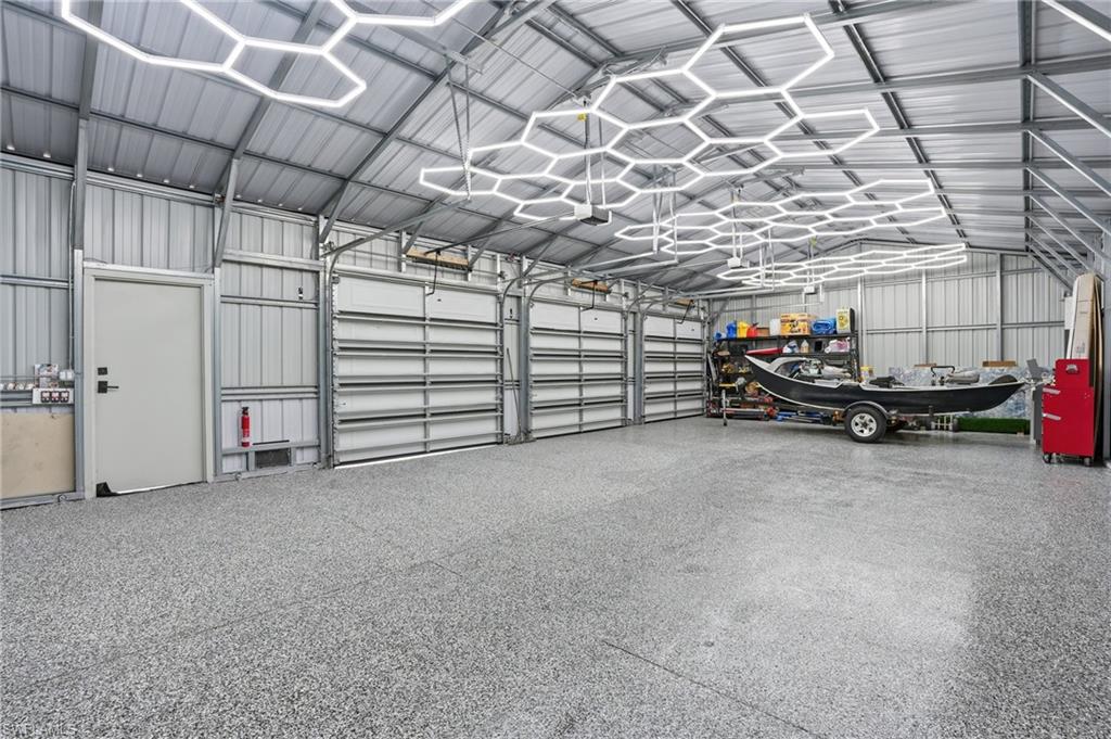 3155 64th Street Southwest Naples, FL 34105 - Photo 24 of 45 a view of a room with gym equipment