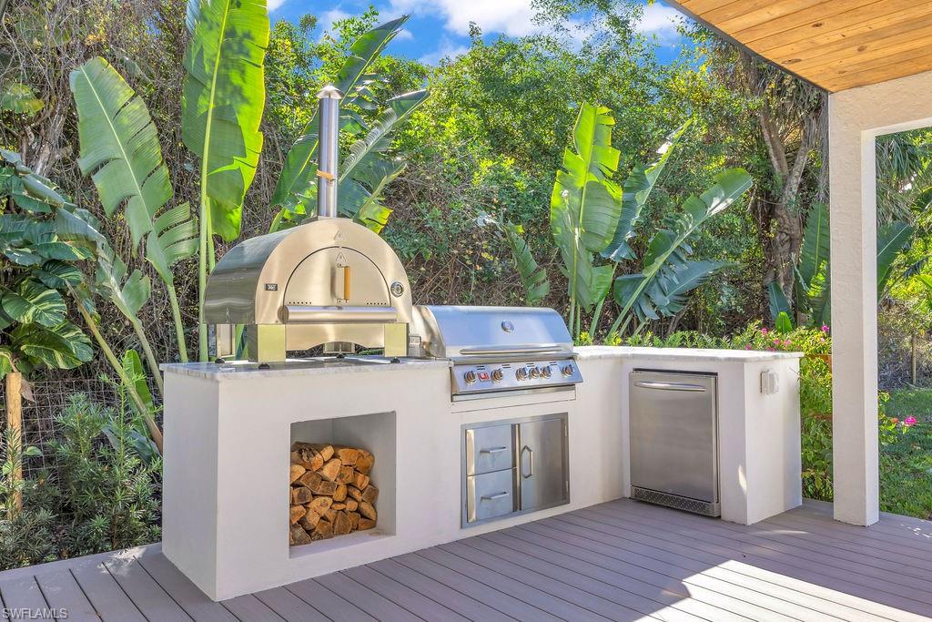 3155 64th Street Southwest Naples, FL 34105 - Photo 26 of 45 a view of entryway with yard