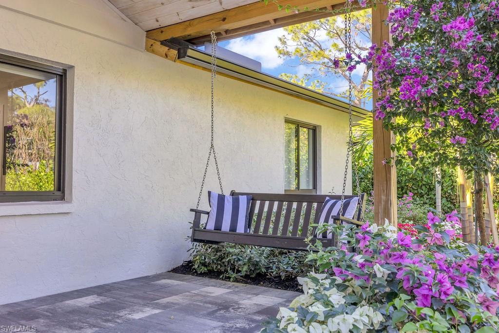 3155 64th Street Southwest Naples, FL 34105 - Photo 37 of 45 a view of a porch with furniture