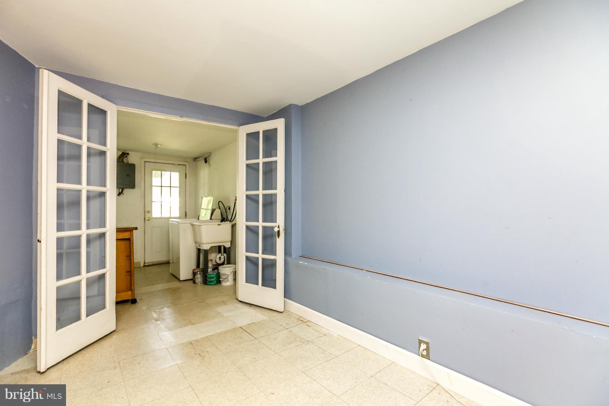 1122 Roland Heights Avenue Baltimore, MD 21211 - Photo 25 of 30 French Doors to Laundry Room