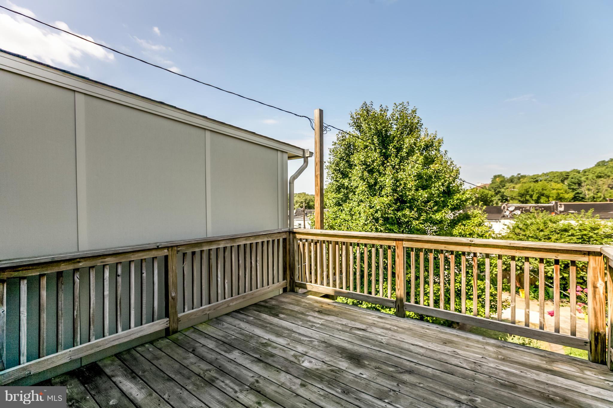 1122 Roland Heights Avenue Baltimore, MD 21211 - Photo 28 of 30 Expansive Rear Deck