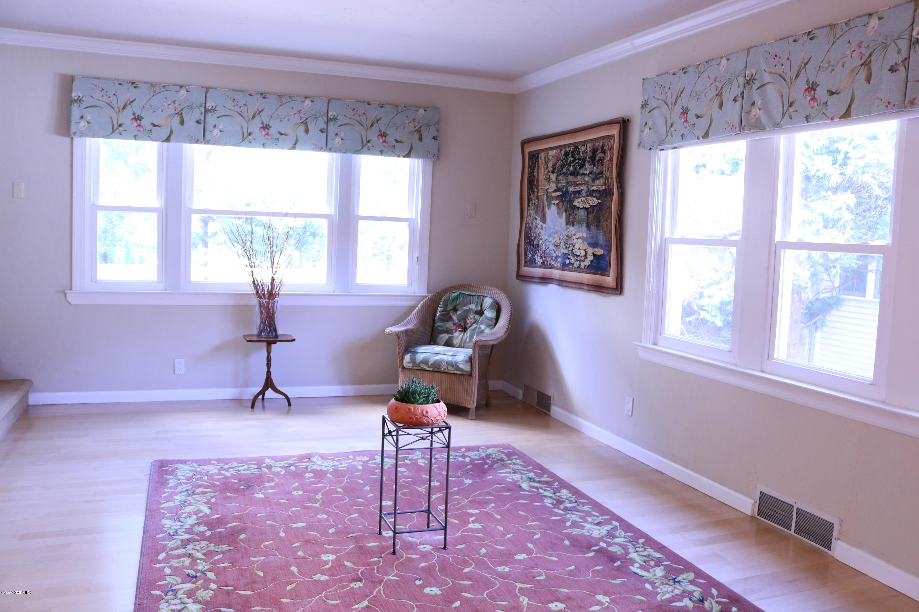 57 Shore Road Old Greenwich, CT 06870 - Photo 11 of 30 a living room with furniture and a window