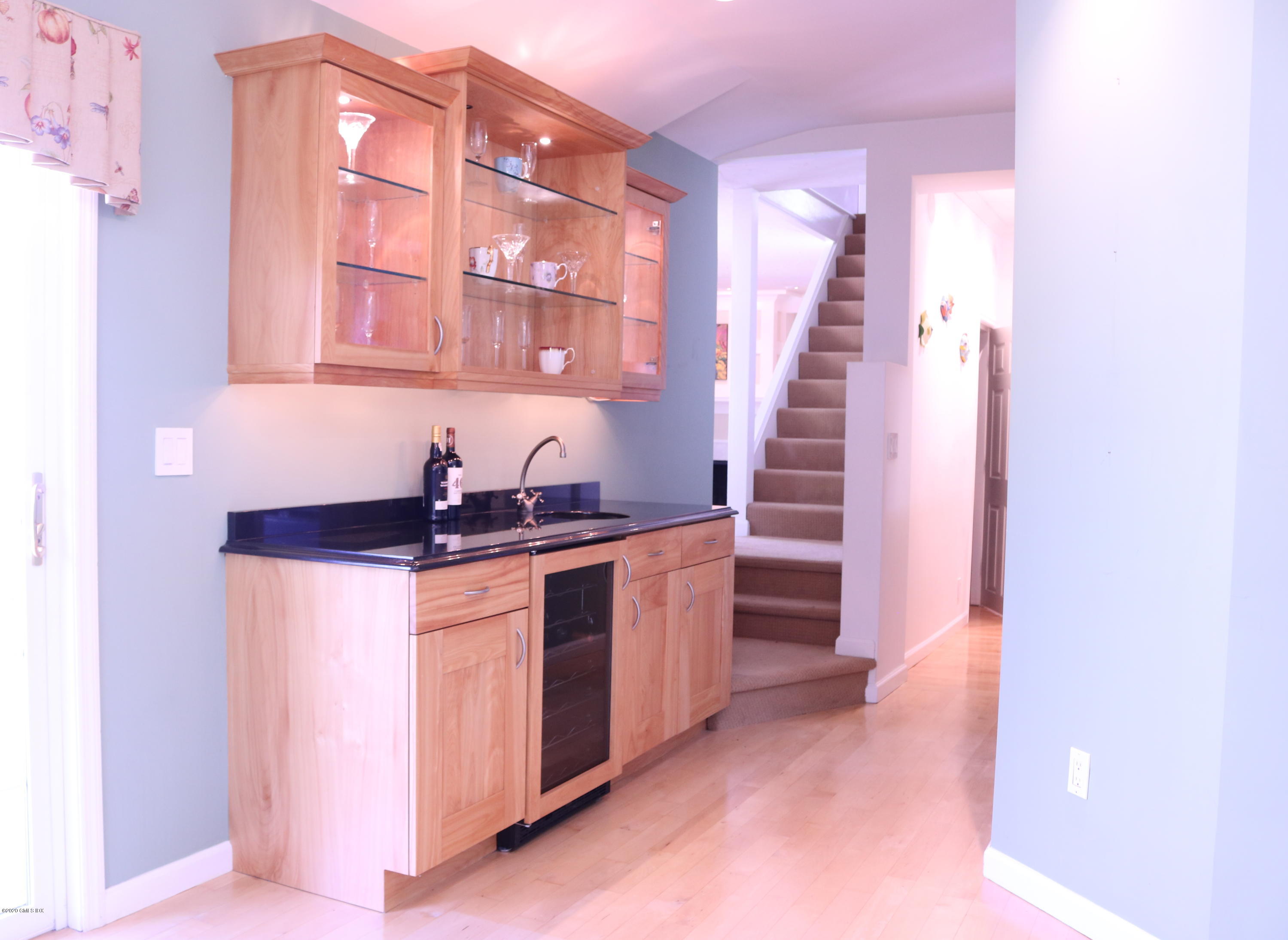 57 Shore Road Old Greenwich, CT 06870 - Photo 12 of 30 a kitchen with granite countertop a sink and a stove top oven