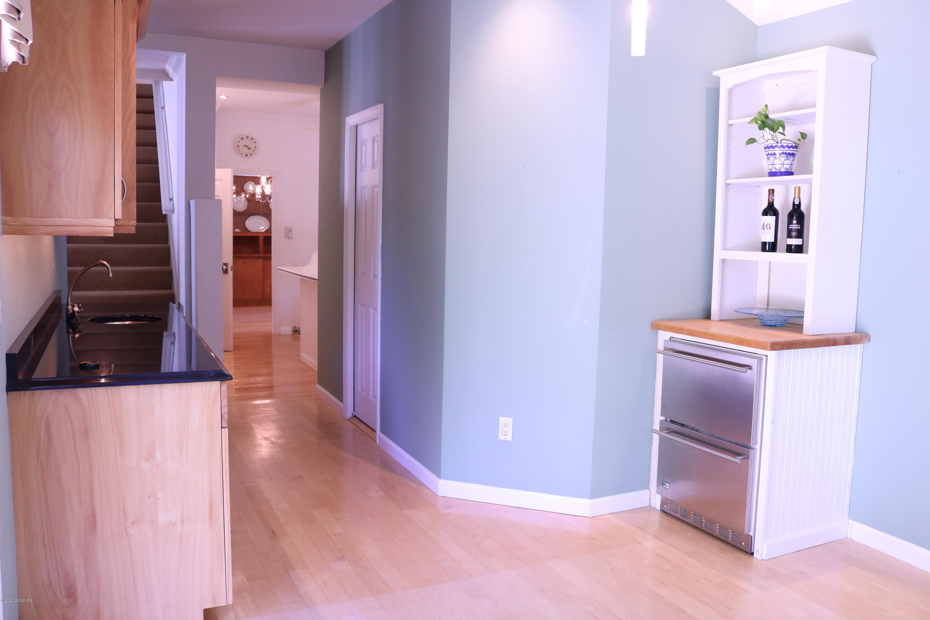 57 Shore Road Old Greenwich, CT 06870 - Photo 13 of 30 a view of a hallway with seating area