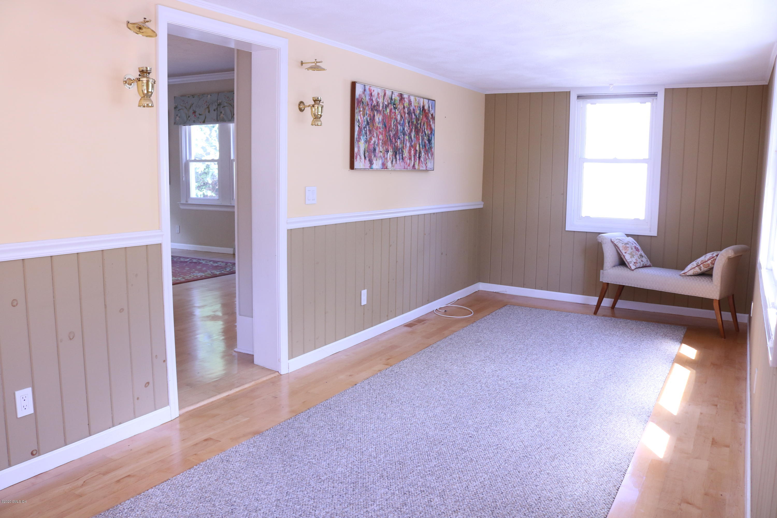 57 Shore Road Old Greenwich, CT 06870 - Photo 16 of 30 a view of livingroom with furniture and windows