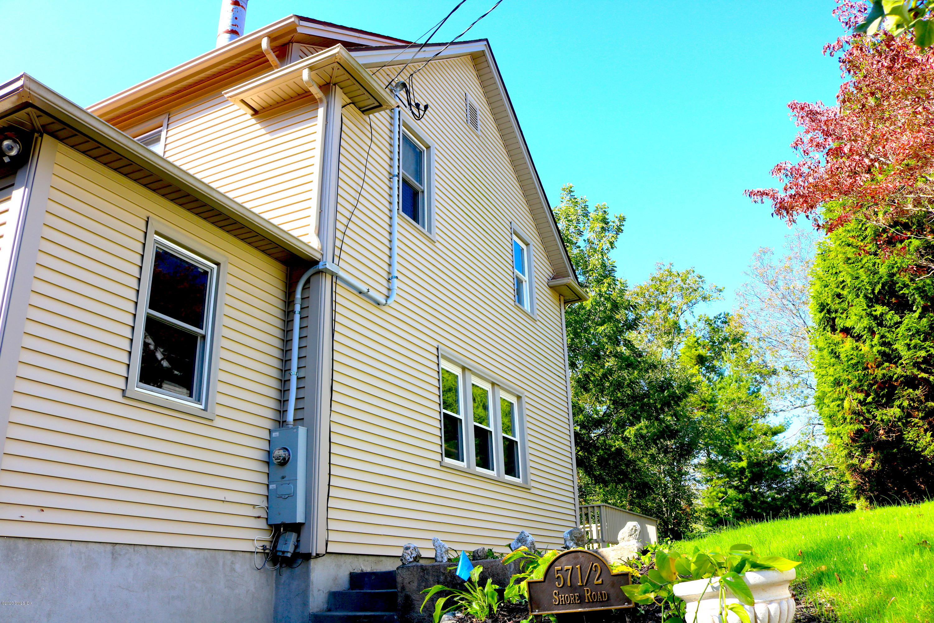 57 Shore Road Old Greenwich, CT 06870 - Photo 30 of 30 a view of a house with a yard