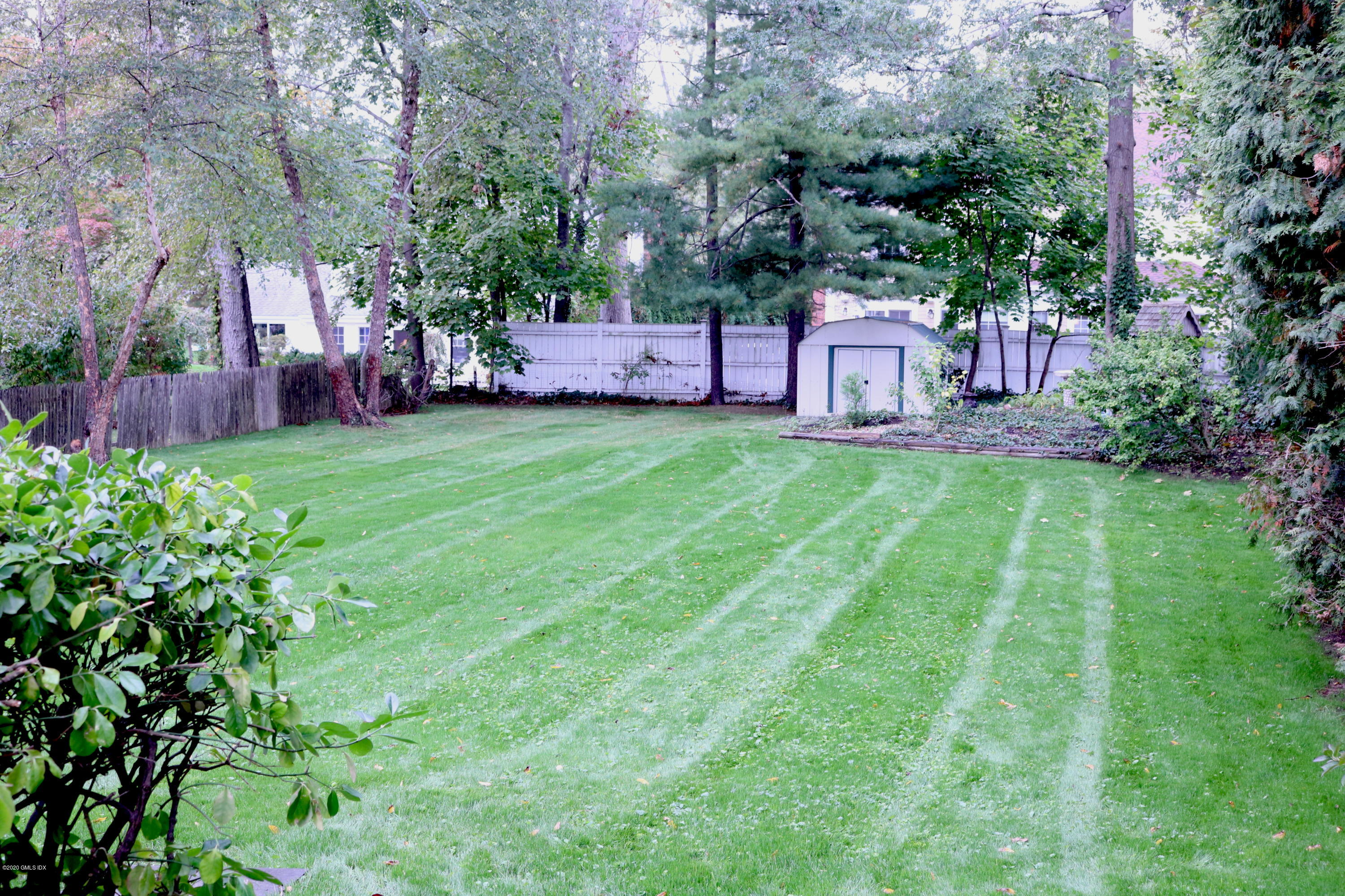 57 Shore Road Old Greenwich, CT 06870 - Photo 7 of 30 a view of a back yard