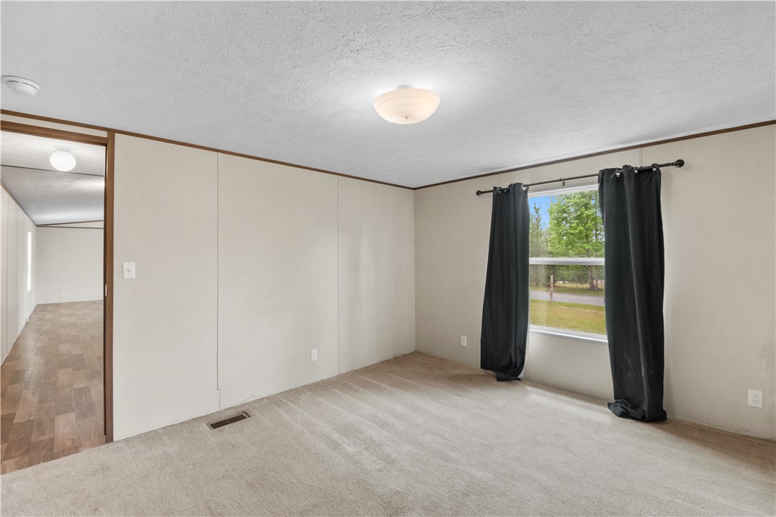 1188 Old Liberty Road Easley, SC 29640 - Photo 18 of 28 An inviting room provides comfort and views of nature.