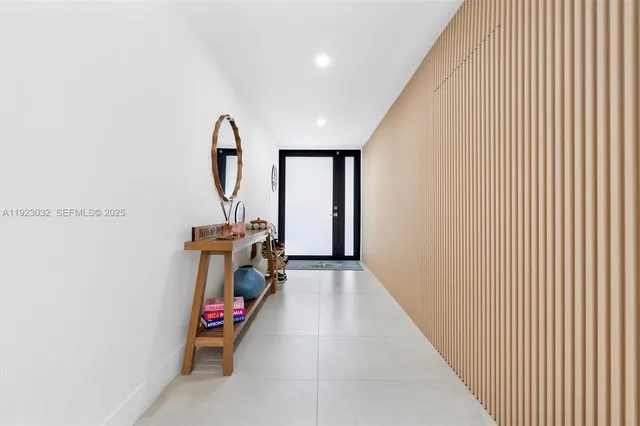 a view of a house with a yard and plants