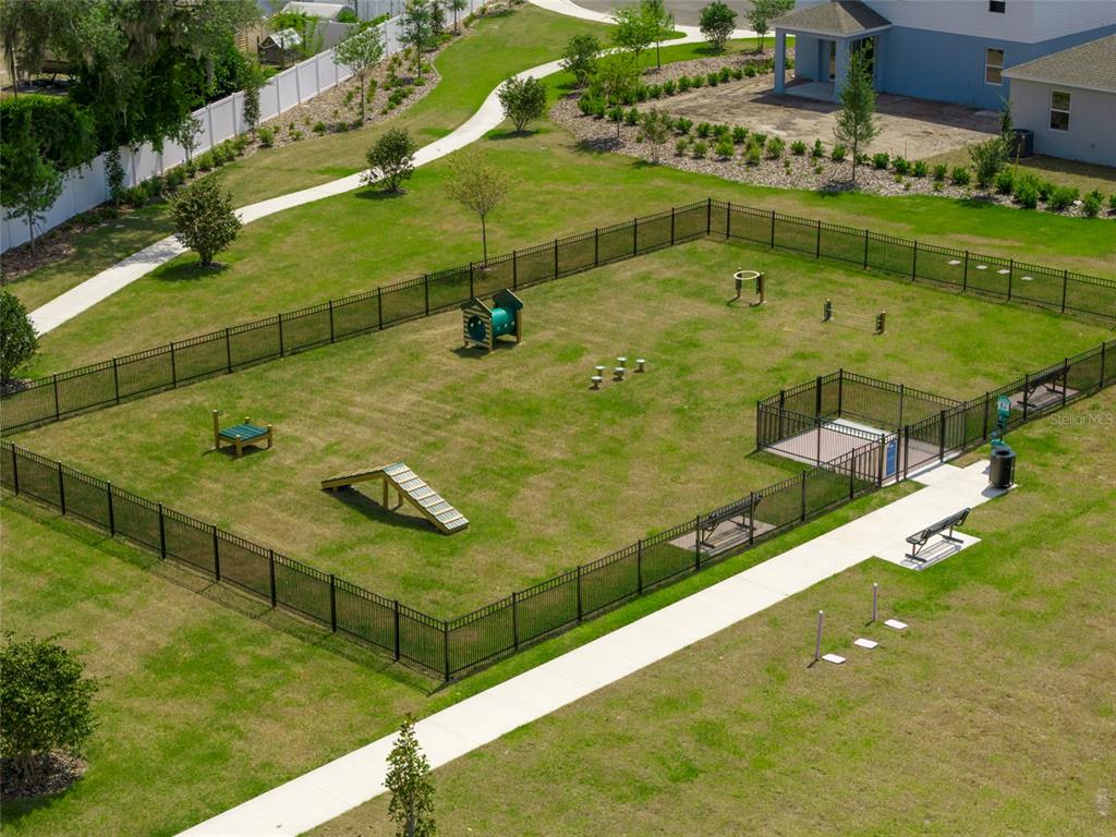 6080 Vision Road St. Cloud, FL 34771 - Photo 3 of 6 a view of a swimming pool with a yard