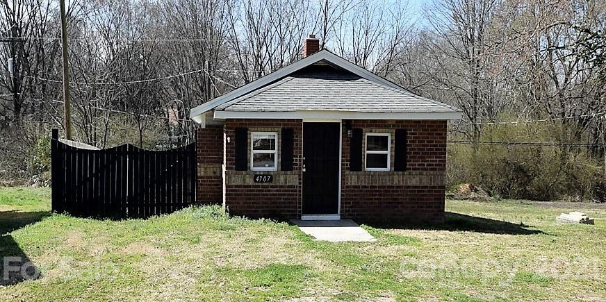 4707 Boyd Griffin Road Monroe, NC 28110 - Photo 2 of 12 a front view of a house with a yard