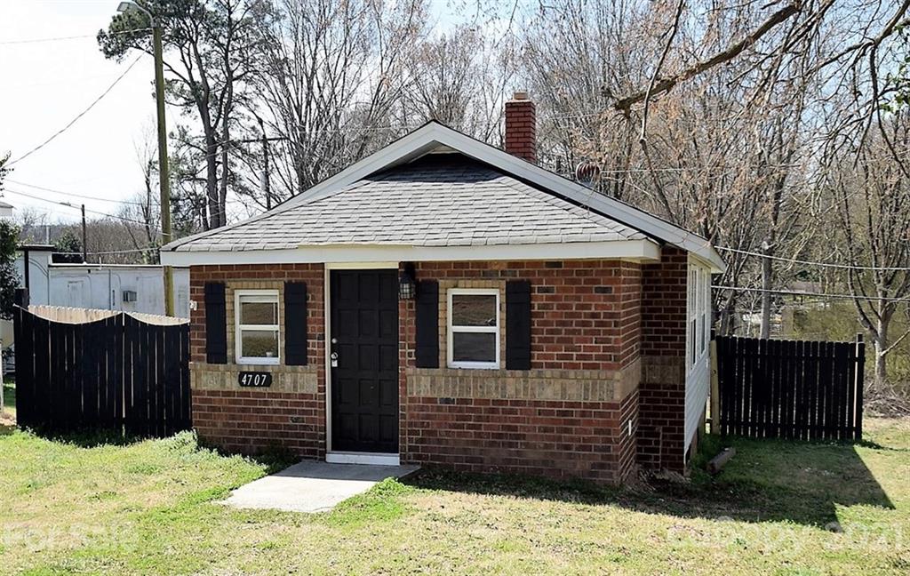 4707 Boyd Griffin Road Monroe, NC 28110 - Photo 3 of 12 a front view of a house with a yard
