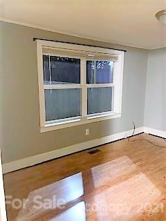 4707 Boyd Griffin Road Monroe, NC 28110 - Photo 4 of 12 a view of an empty room with a window