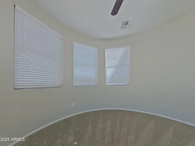 a bathroom with a toilet a sink and shower