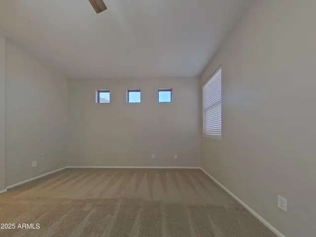 a large kitchen with stainless steel appliances granite countertop a stove top oven a sink and dishwasher