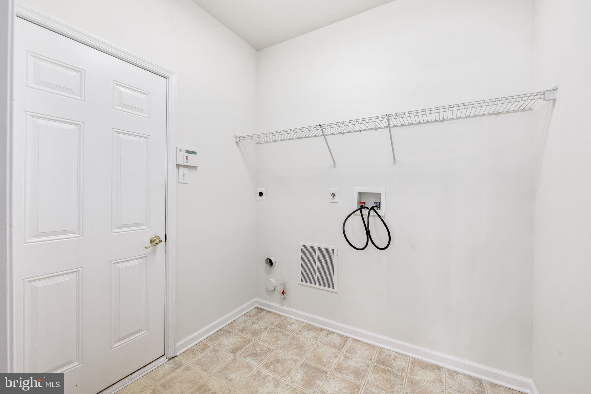 1204 Dawman Road Coatesville, PA 19320 - Photo 11 of 31 Laundry on Main Floor