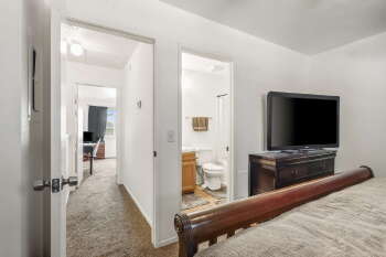 1666 Palma Road Bullhead City, AZ 86442 - Photo 14 of 22 a bedroom with a bed and a flat screen tv