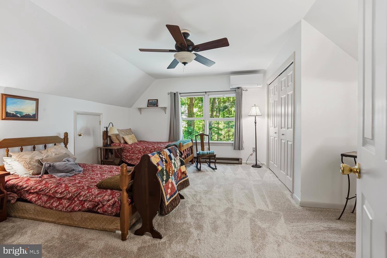 814 Wrights Neck Road Centreville, MD 21617 - Photo 47 of 53 a bed room with a bed and a large window