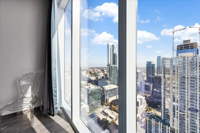 a view of a city from a living room