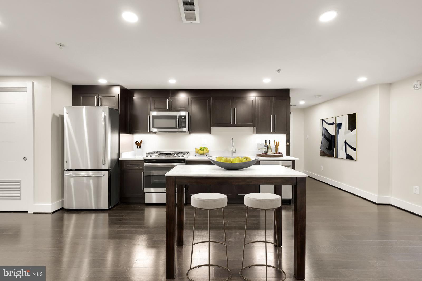 1331 K Street Southeast, Unit 102 Washington, DC 20003 - Photo 4 of 17 Virtually Staged Similar to how property looks