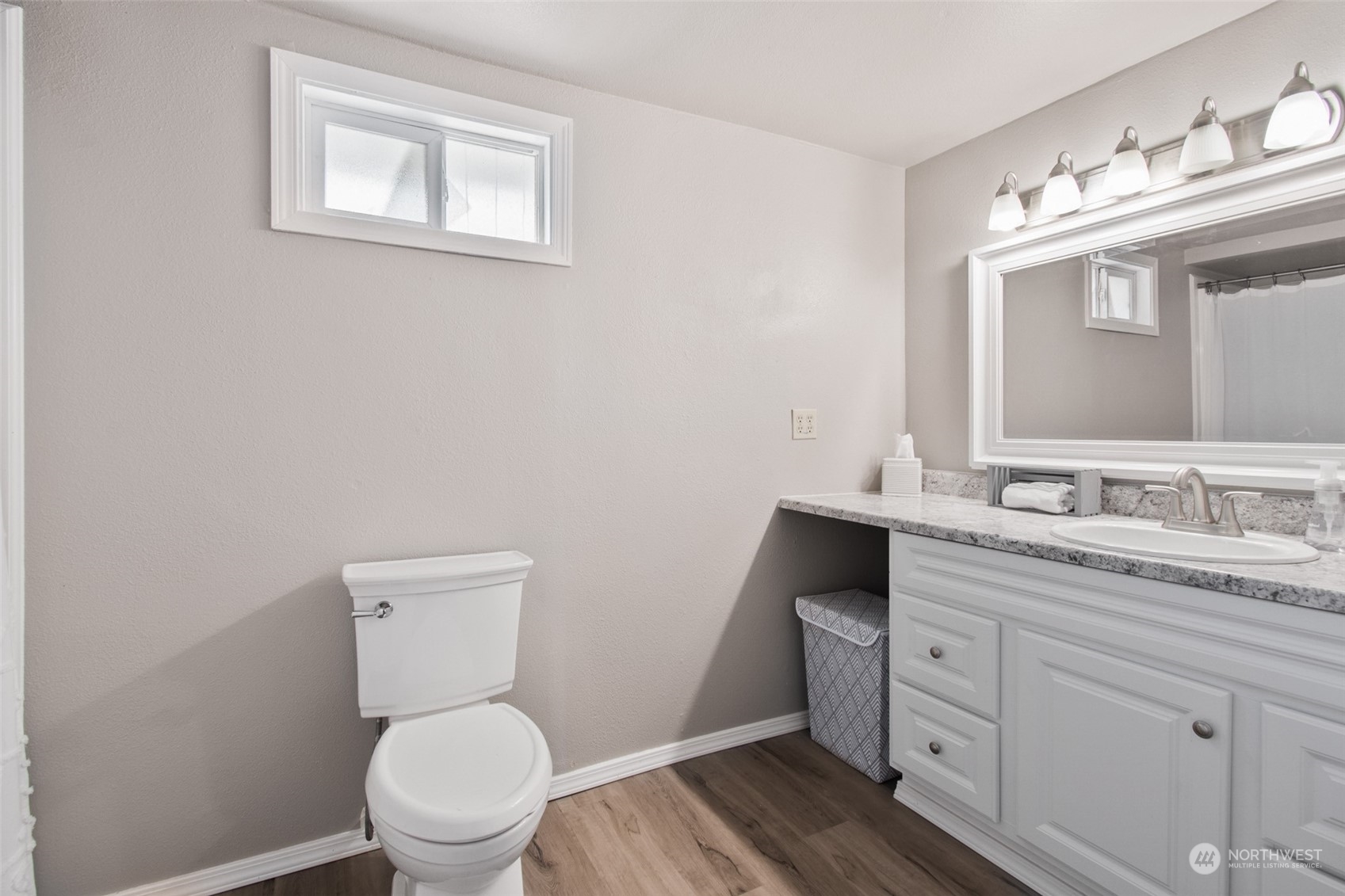 4840 176th Avenue Southwest Rochester, WA 98579 - Photo 12 of 38 a bathroom with a toilet a sink and mirror