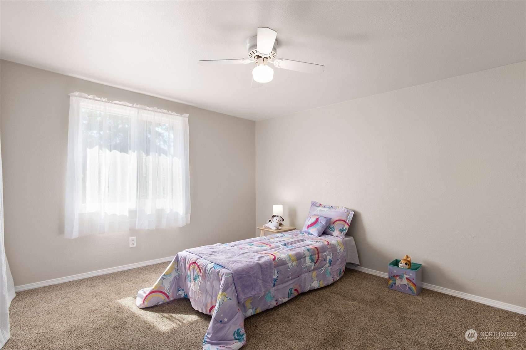 4840 176th Avenue Southwest Rochester, WA 98579 - Photo 13 of 38 a bedroom with a bed and a window