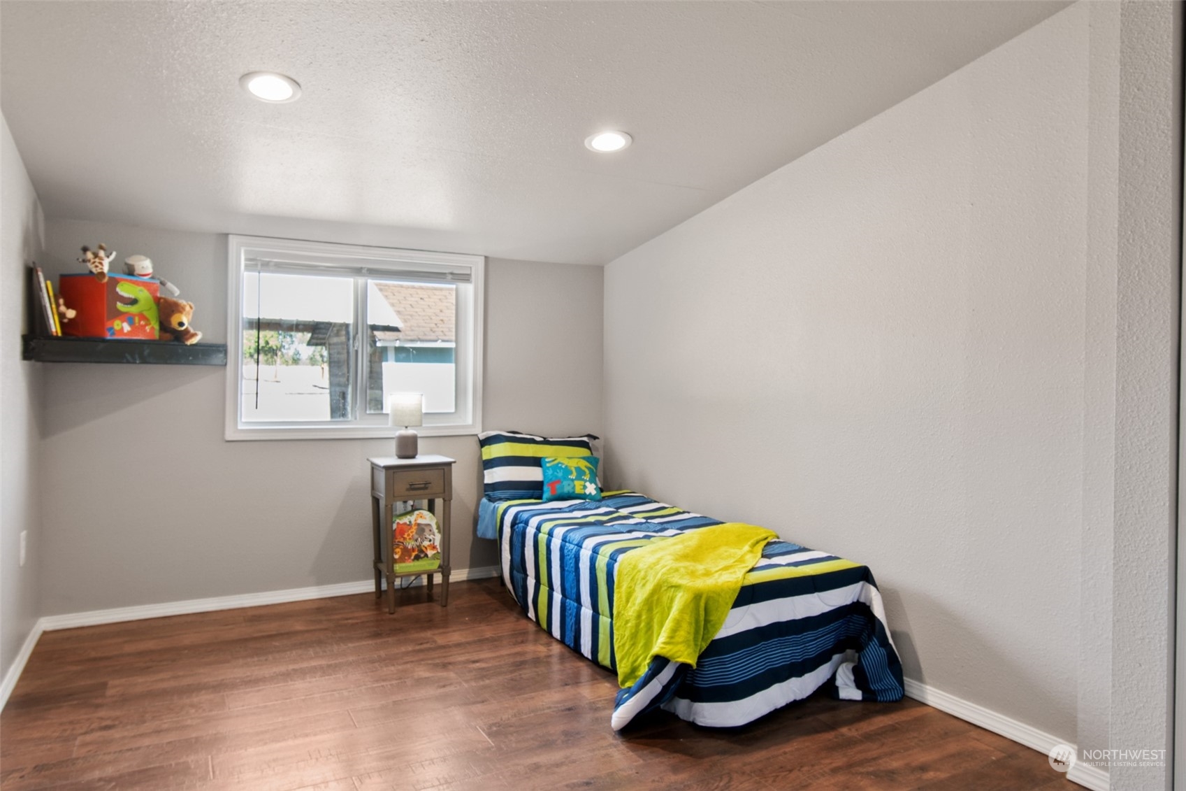 4840 176th Avenue Southwest Rochester, WA 98579 - Photo 14 of 38 a bedroom with a bed and a window