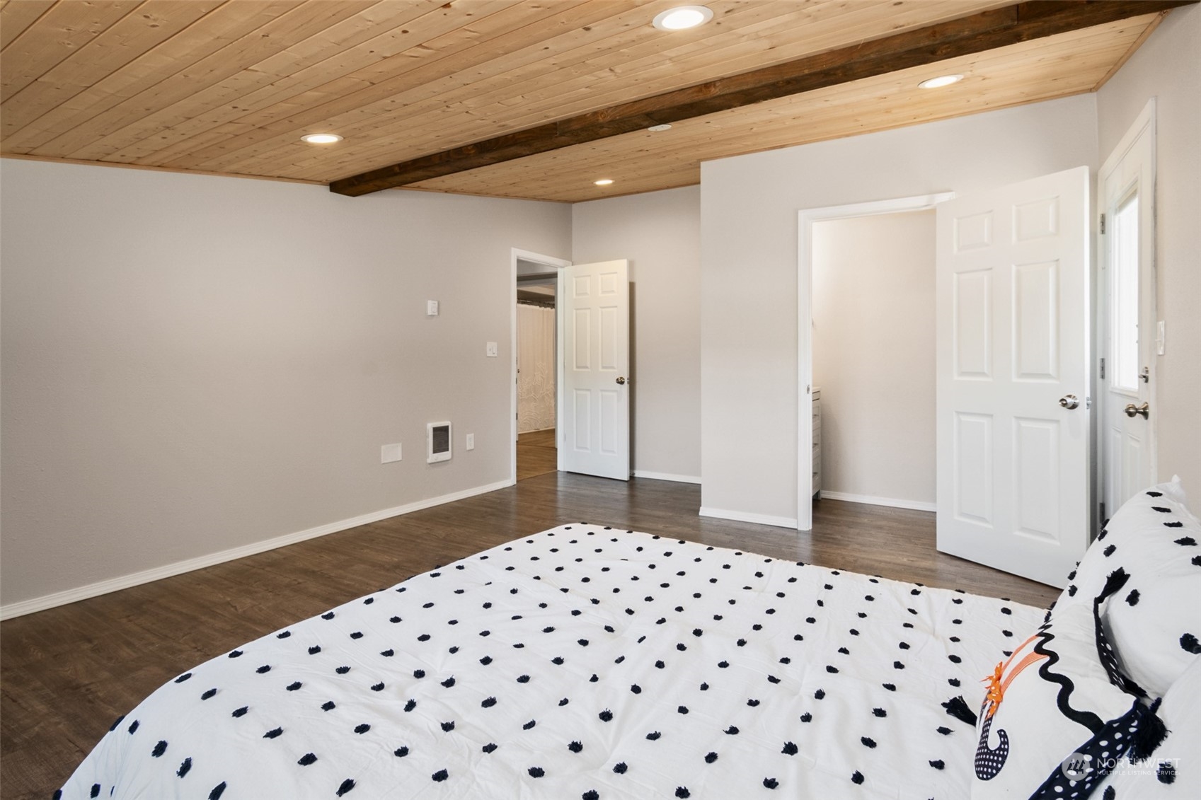 4840 176th Avenue Southwest Rochester, WA 98579 - Photo 16 of 38 a bedroom with a bed and a black white wall