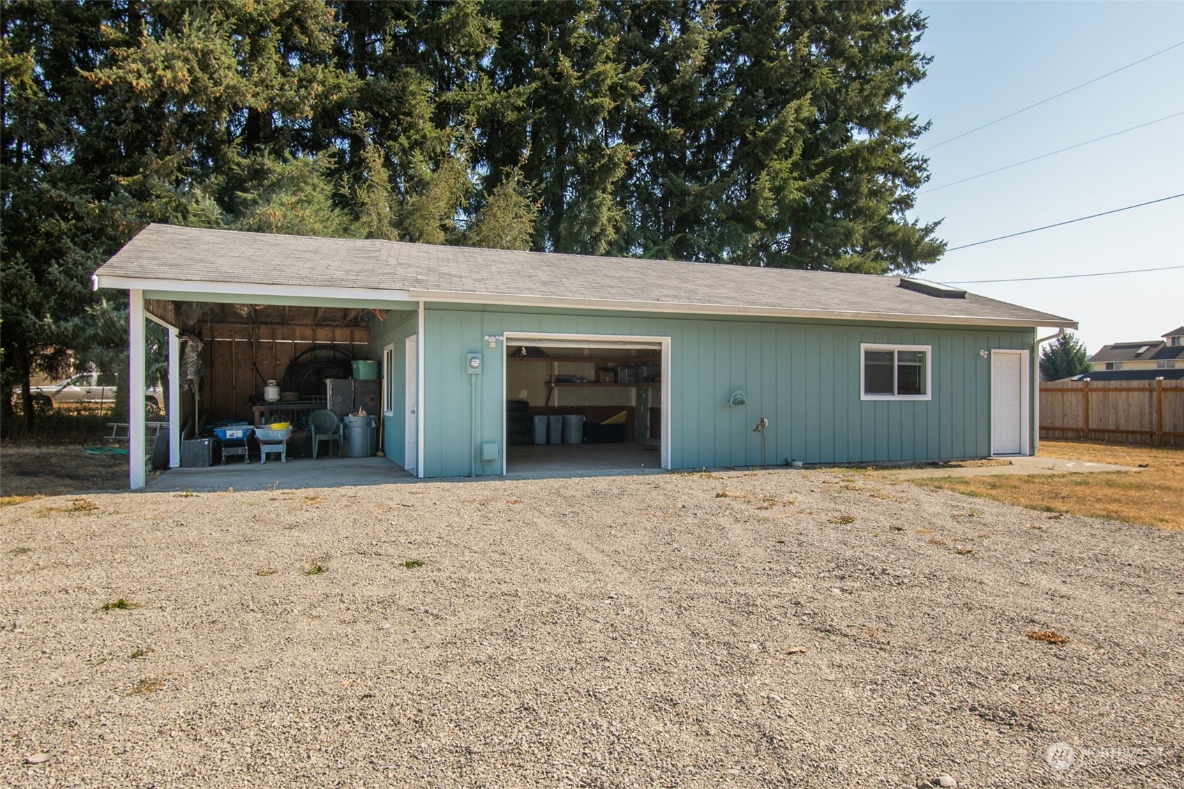 4840 176th Avenue Southwest Rochester, WA 98579 - Photo 21 of 38 a house with trees in the background