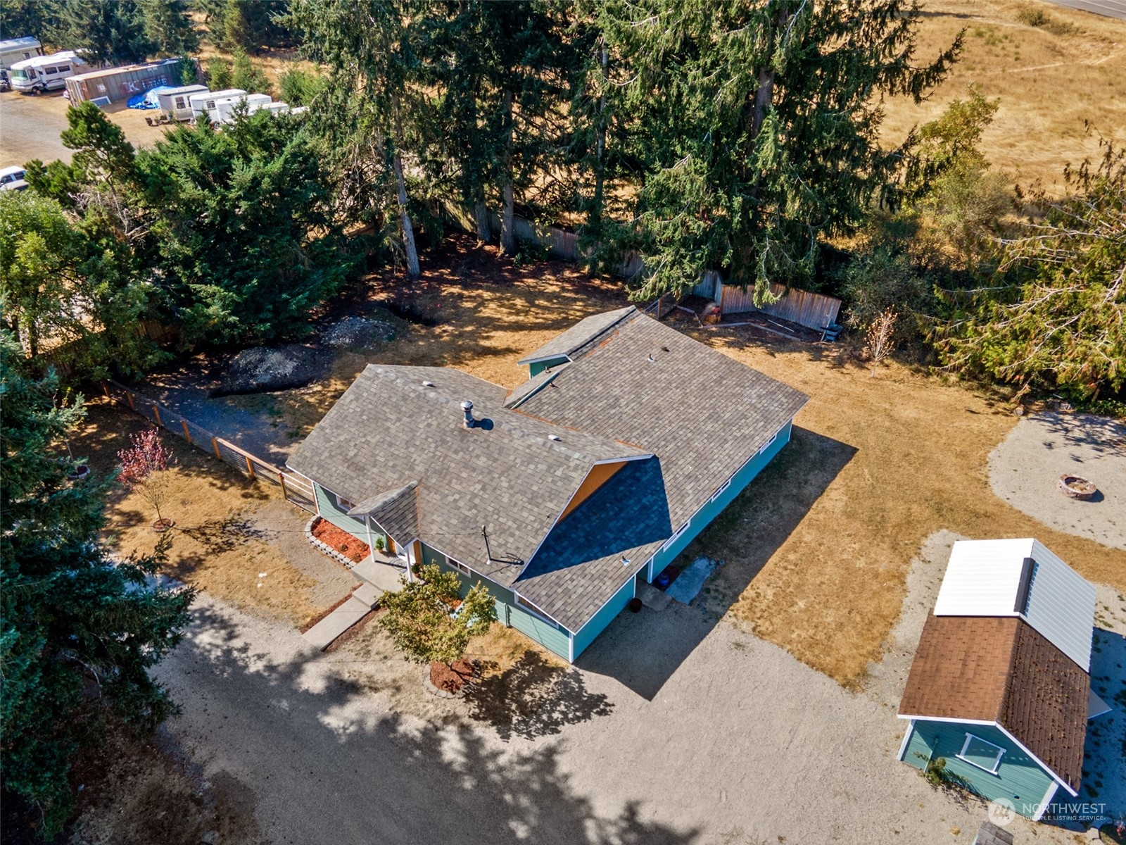 4840 176th Avenue Southwest Rochester, WA 98579 - Photo 33 of 38 a view of a backyard with sitting area