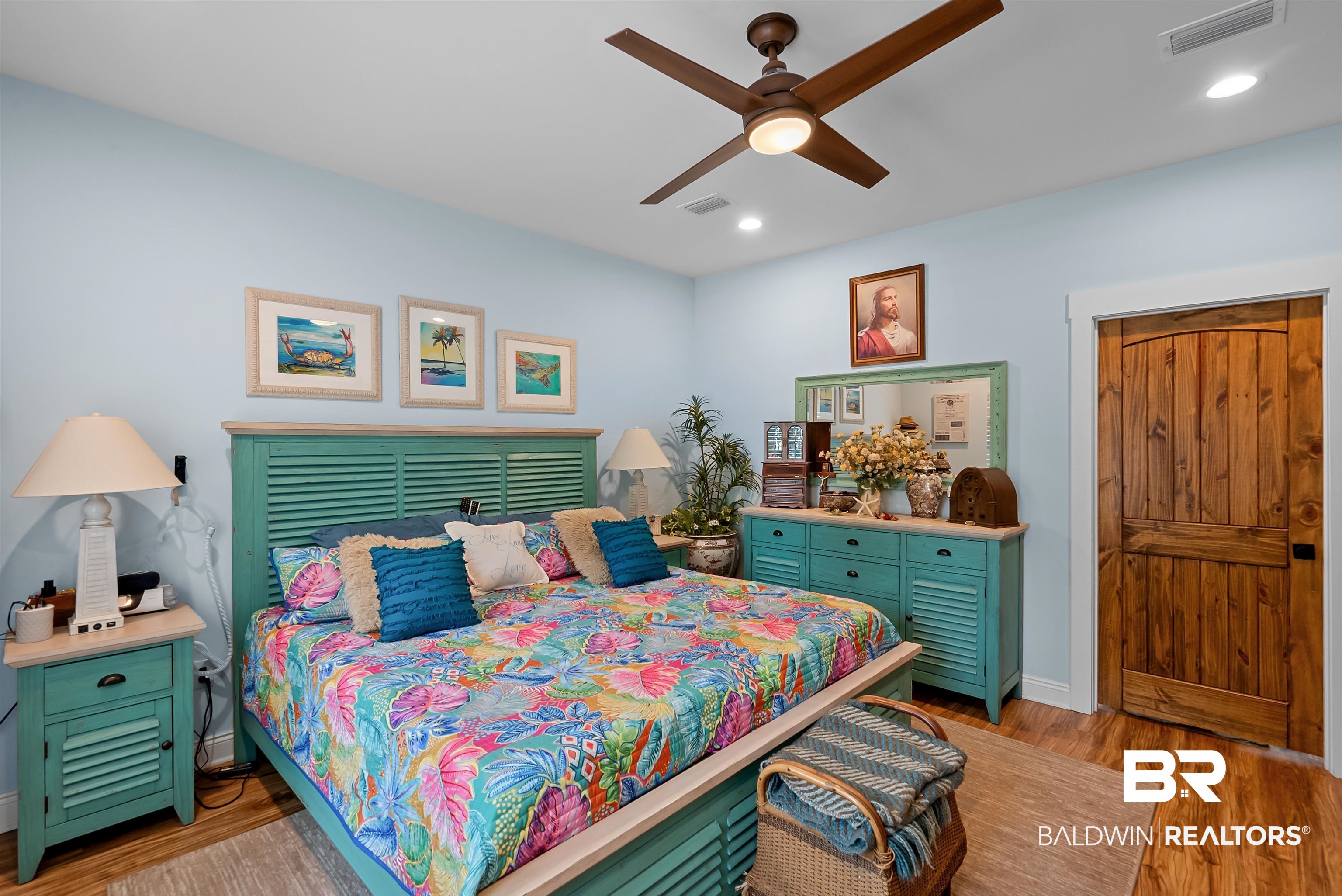7266 Franklin Road Foley, AL 36535 - Photo 23 of 64 Spacious room featuring light blue walls, wood-finish flooring, and a ceiling fan with integrated lighting