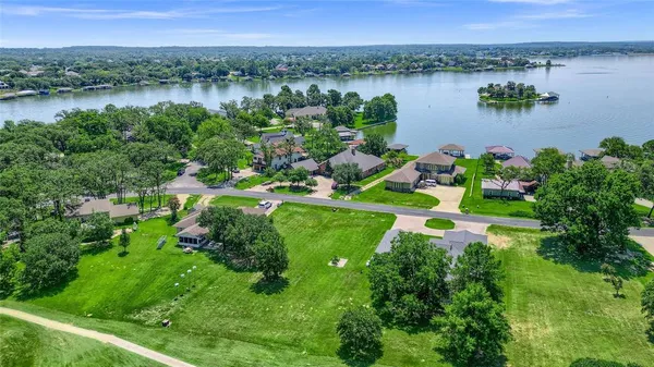 a view of a lake with a city