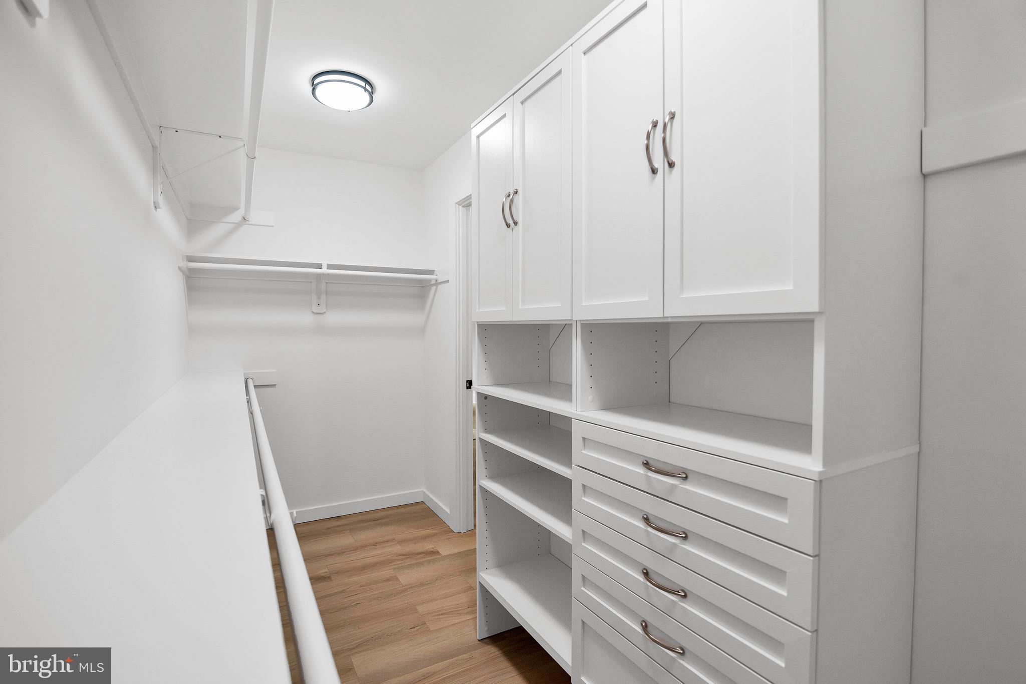 6101 Edsall Road, Unit 602 Alexandria, VA 22304 - Photo 21 of 38 a view of walk in closet with empty racks