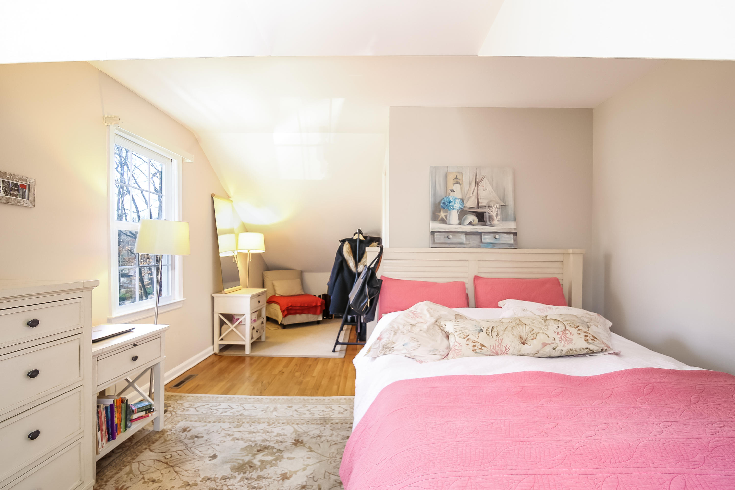 228 Laurel Road New Canaan, CT 06840 - Photo 18 of 38 a bedroom with a bed and dresser