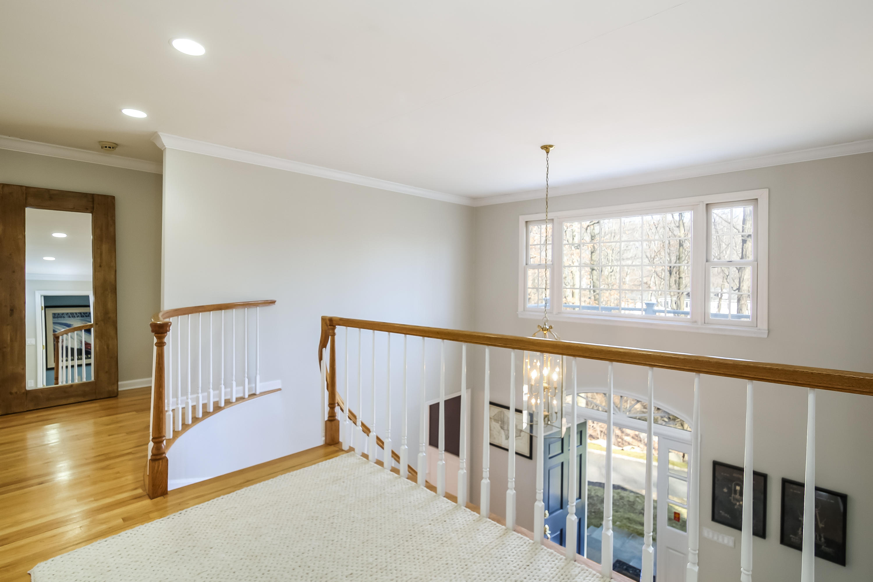 228 Laurel Road New Canaan, CT 06840 - Photo 21 of 38 a view of an entryway with wooden floor