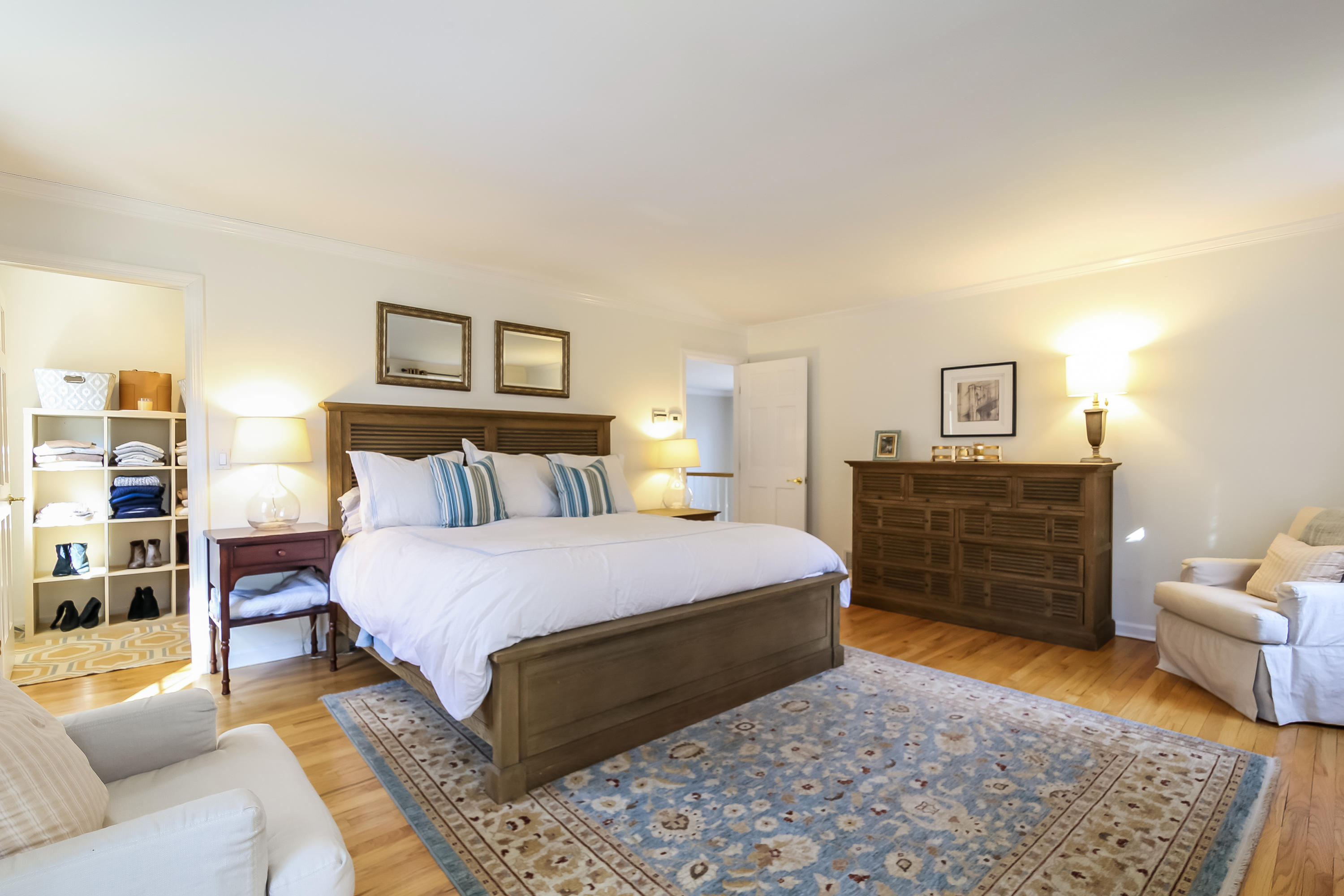 228 Laurel Road New Canaan, CT 06840 - Photo 23 of 38 a bedroom with a bed and dresser