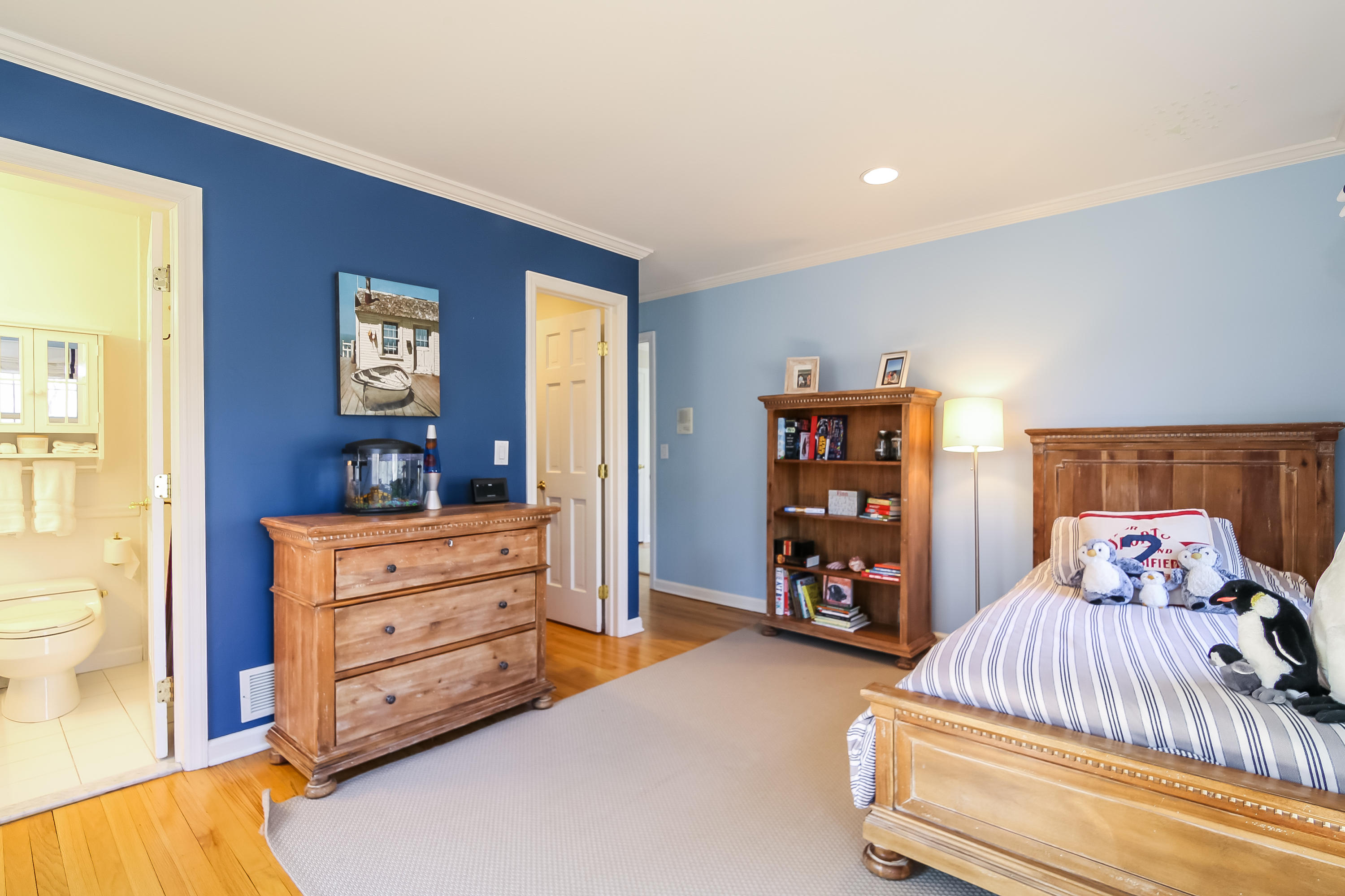 228 Laurel Road New Canaan, CT 06840 - Photo 25 of 38 a bedroom with a bed and a closet