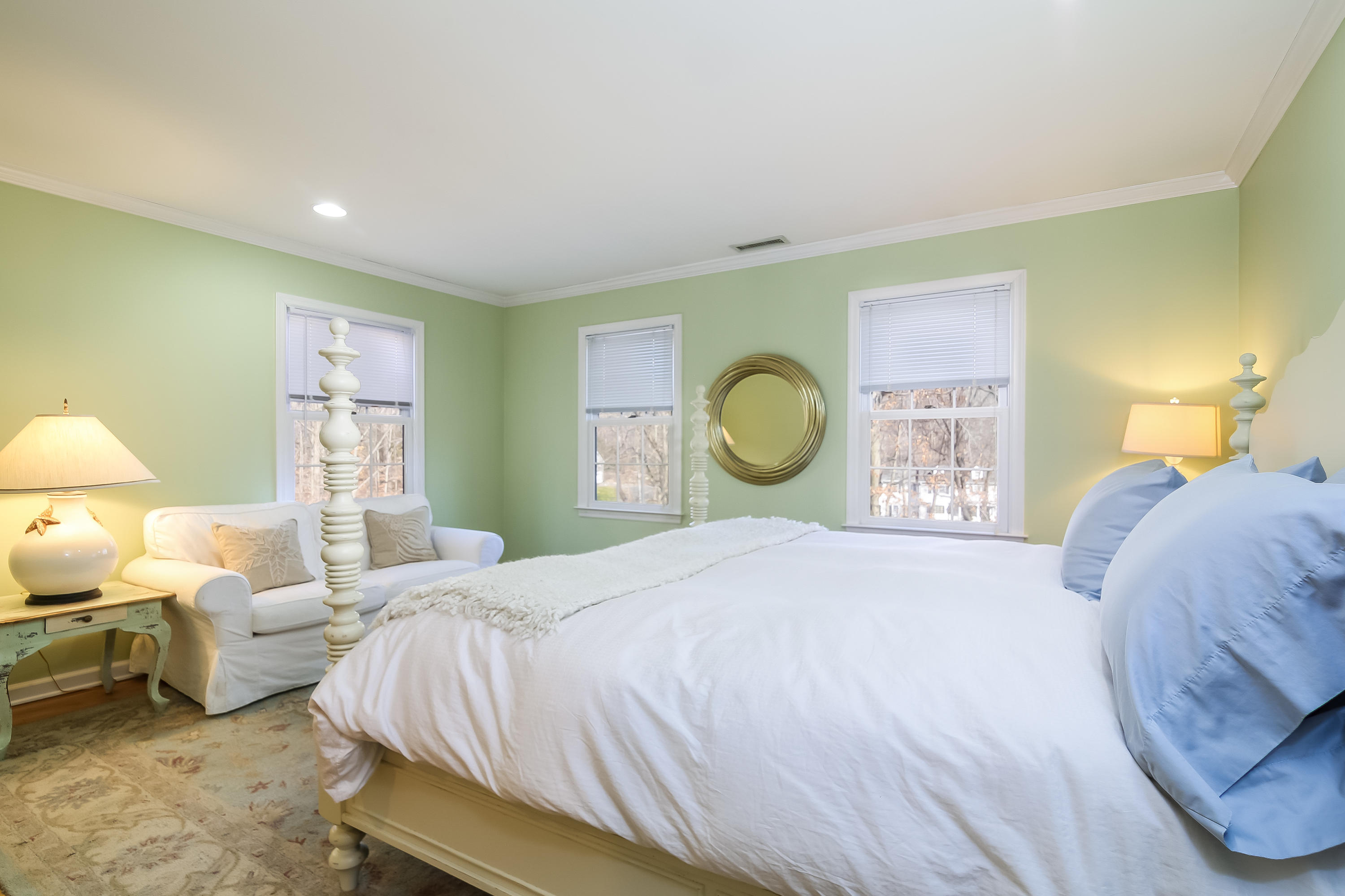 228 Laurel Road New Canaan, CT 06840 - Photo 26 of 38 a bedroom with a bed lamp closet and window