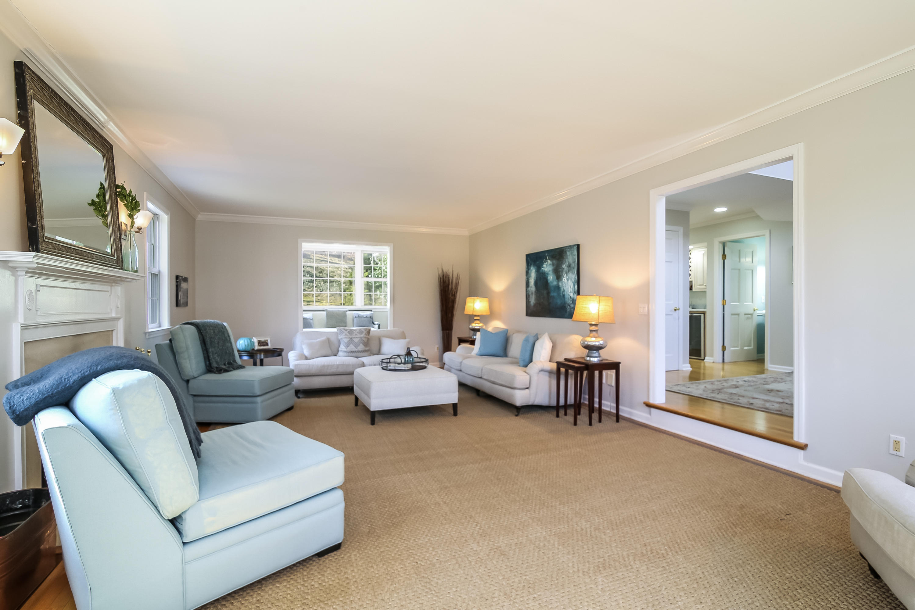 228 Laurel Road New Canaan, CT 06840 - Photo 3 of 38 a living room with furniture and a large window