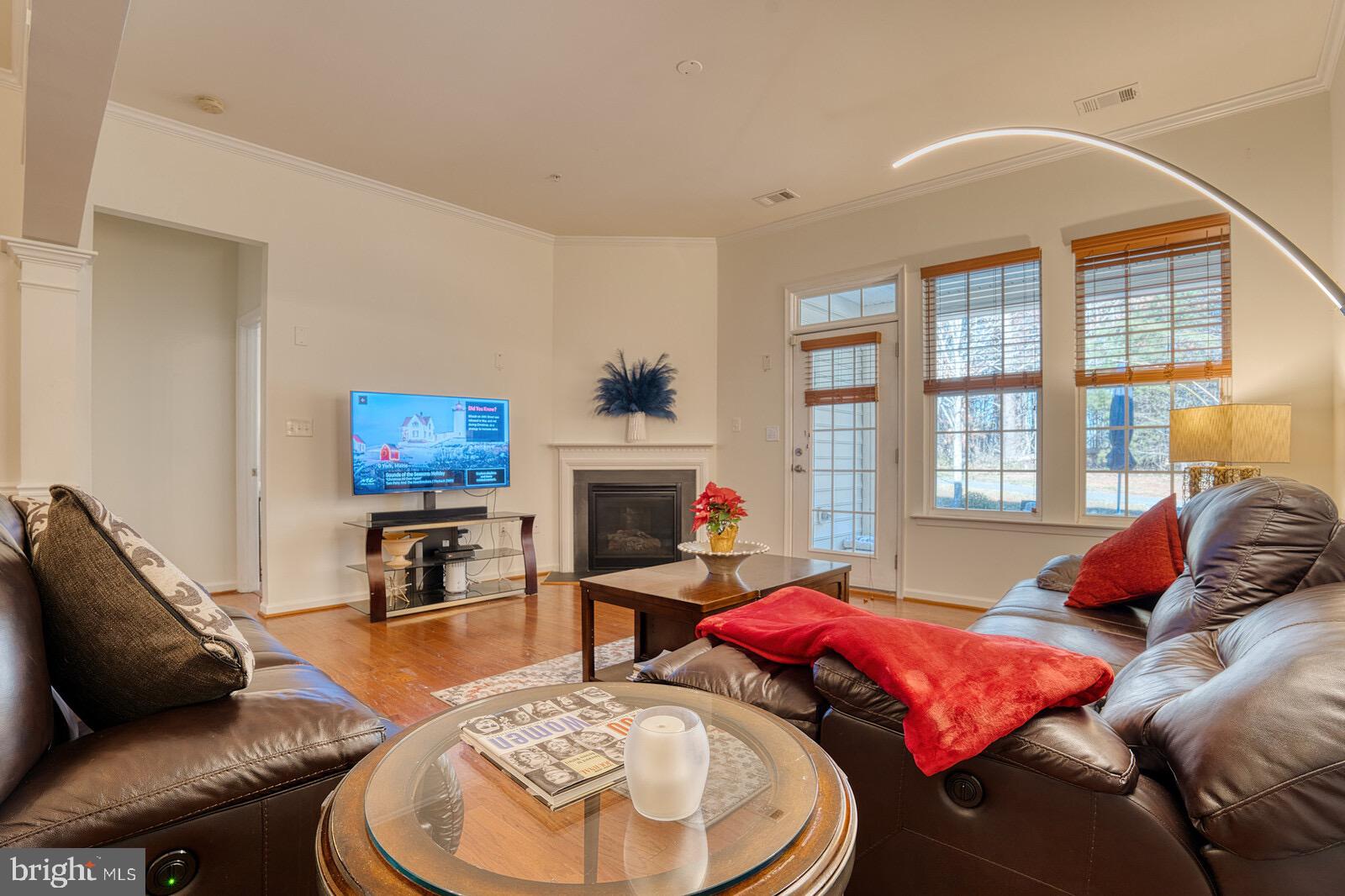 13113 Winding Trail Road Laurel, MD 20707 - Photo 9 of 37 A WELL SITUATED GAS FIREPLACE FOR THOSE COZY NITES