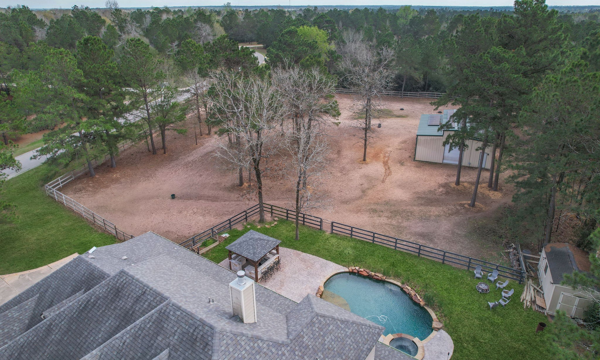 26231 Crown Ranch Boulevard Montgomery, TX 77316 - Photo 44 of 46 an aerial view of a house with a yard basket ball court and outdoor seating