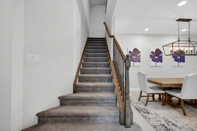 a room with furniture and musical instruments