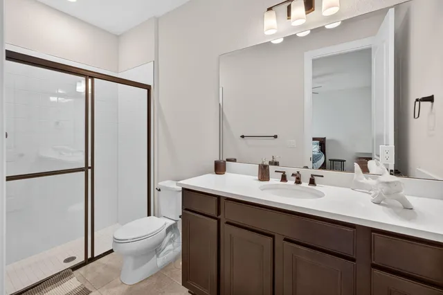 an aerial view of a house with a ocean view